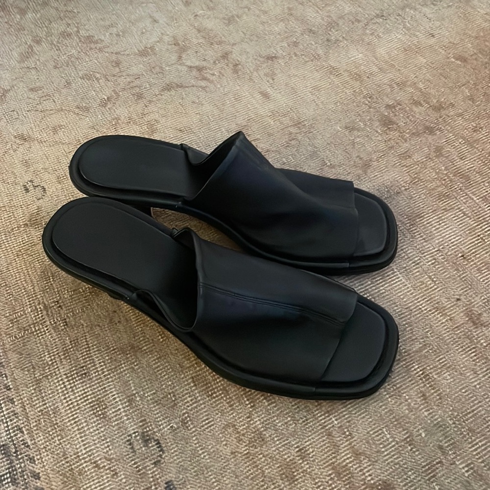By far black mules with heel